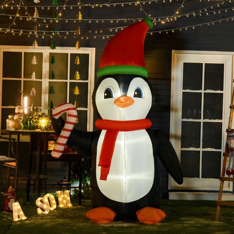 The Holiday Aisle® Gonflable de Noël avec canne à bonbon pingouin et